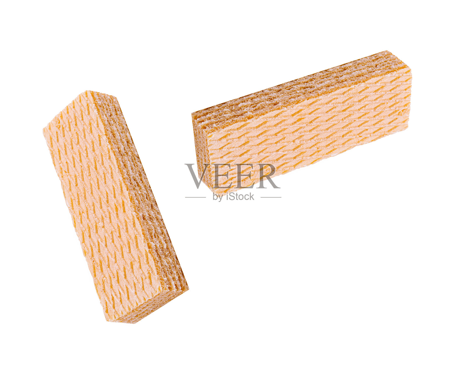 酥脆轻盈的威化饼干静静地放在平坦的表面上，随时准备享用零食或甜点。照片摄影图片