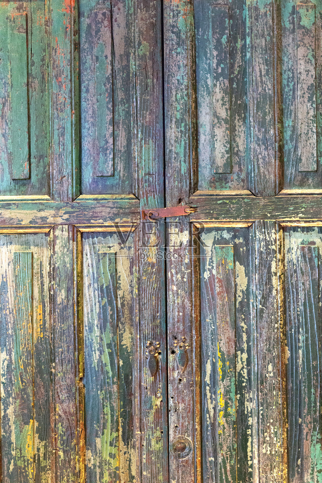 旧磨损的木门。照片摄影图片