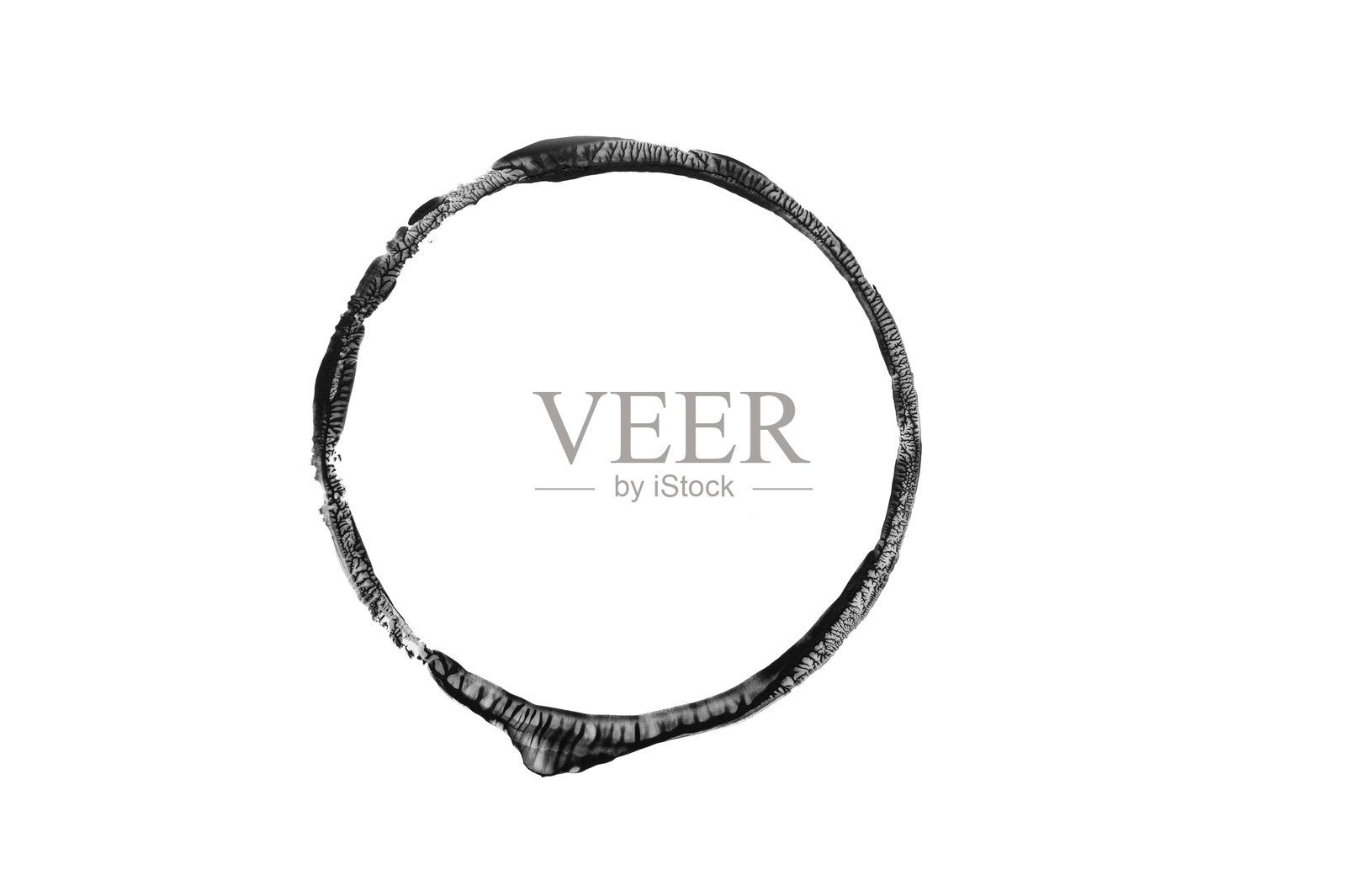 白色背景上的抽象黑色圆形墨水印记照片摄影图片