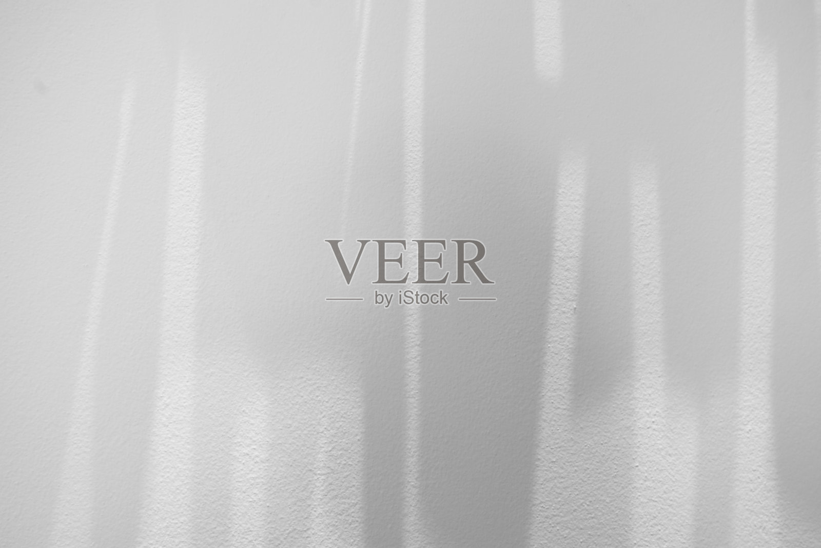 白色背景上的光影图案照片摄影图片