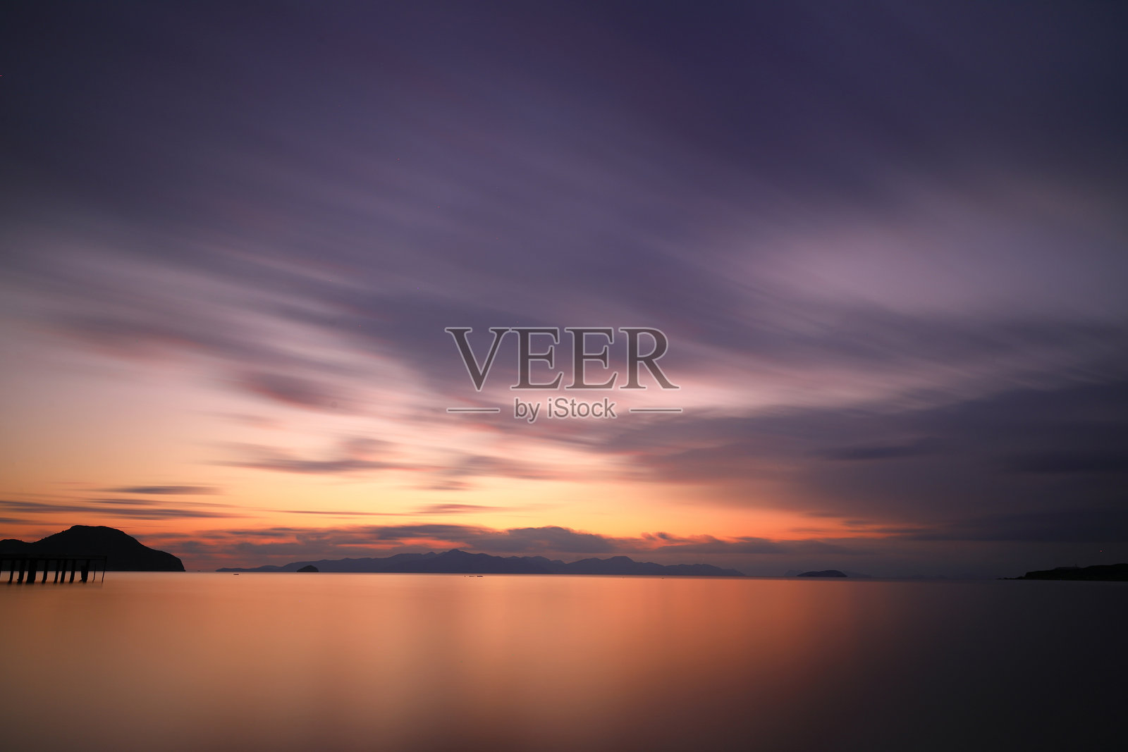 sunset on the beach. Seaside town of Turgutreis and spectacular sunsets. Selective Focus. Long Exposure shoot. tranquility scene.照片摄影图片