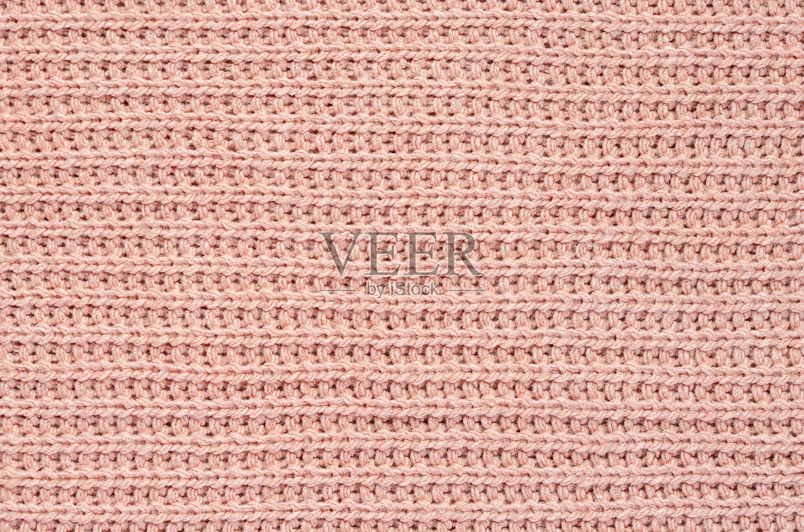 粉色针织布料的特写摄影照片摄影图片