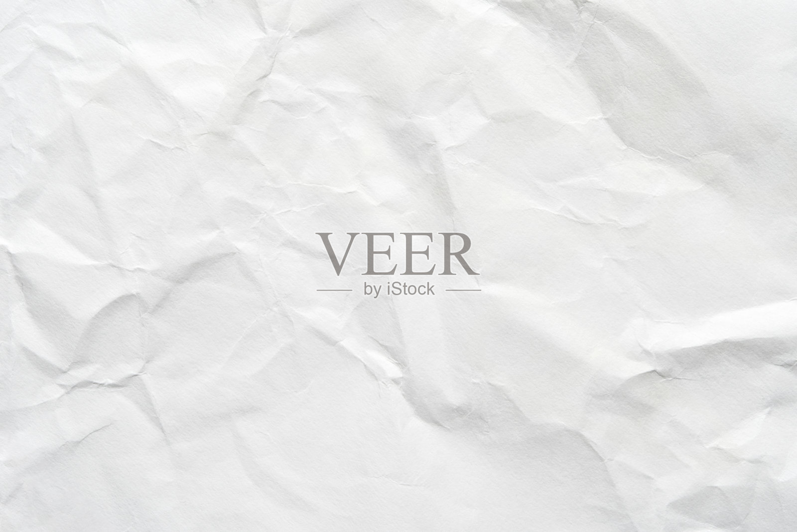 皱褶的白色纸张纹理，带有自然的褶皱和细微的阴影照片摄影图片