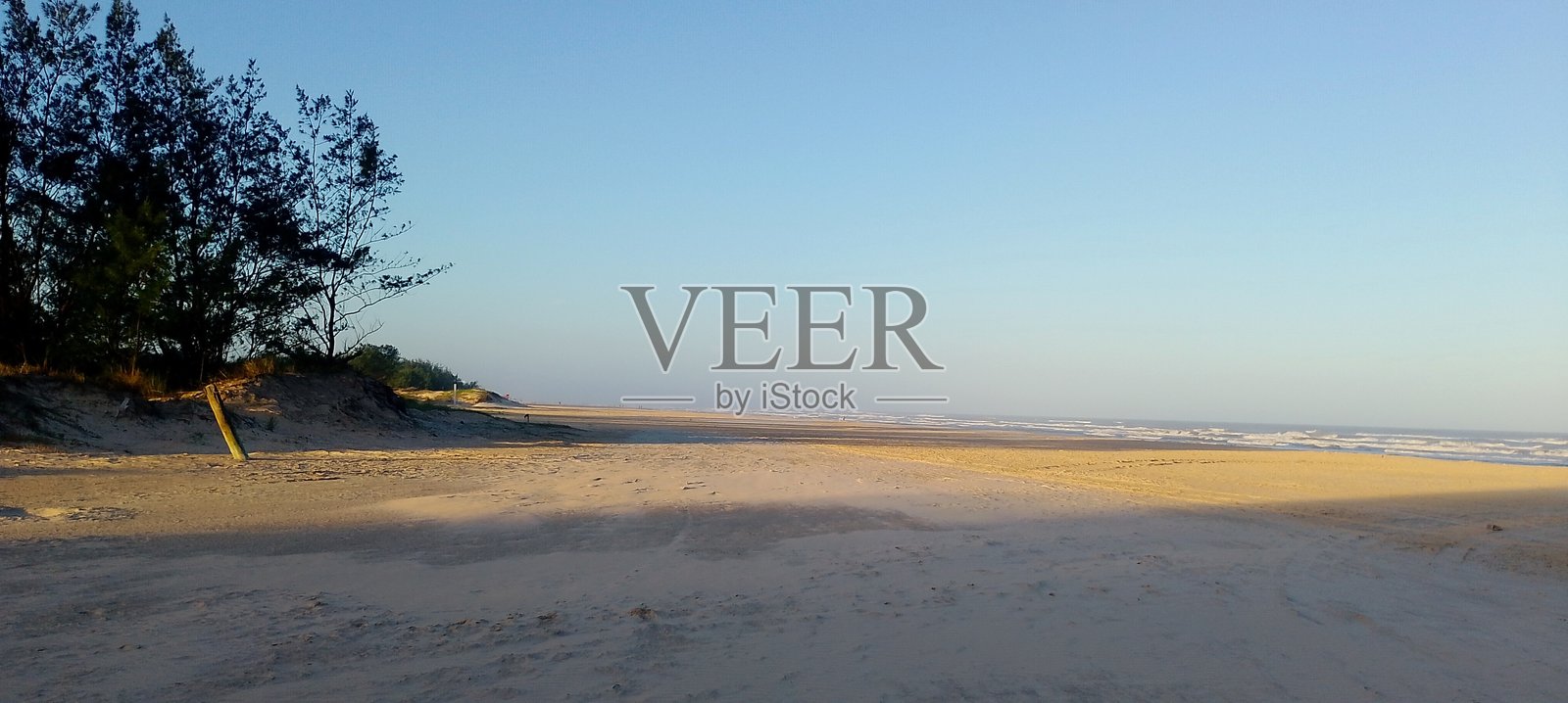 日落时的海滩摄影照片摄影图片