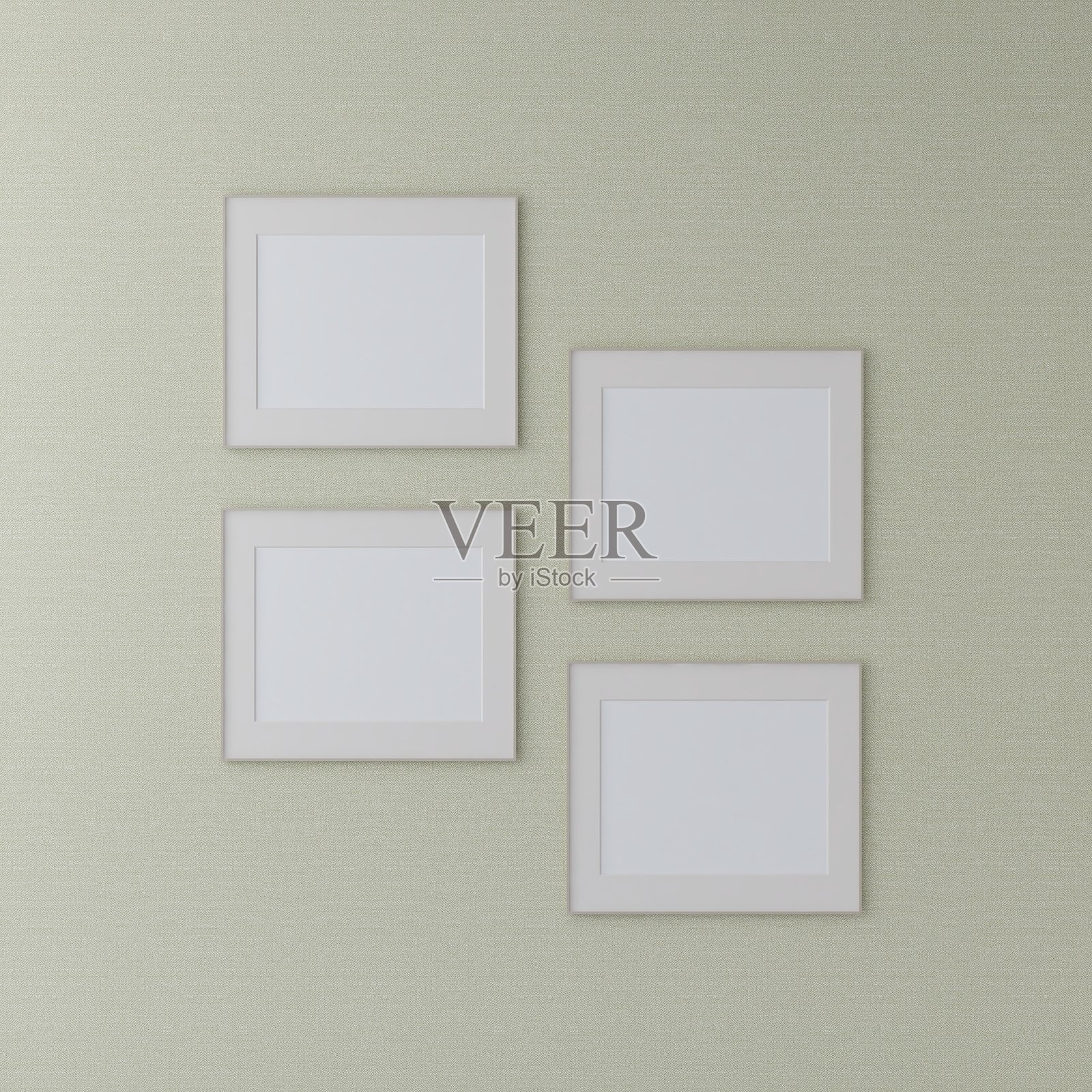 四个空白横向画框的模型，背景为绿色墙壁照片摄影图片