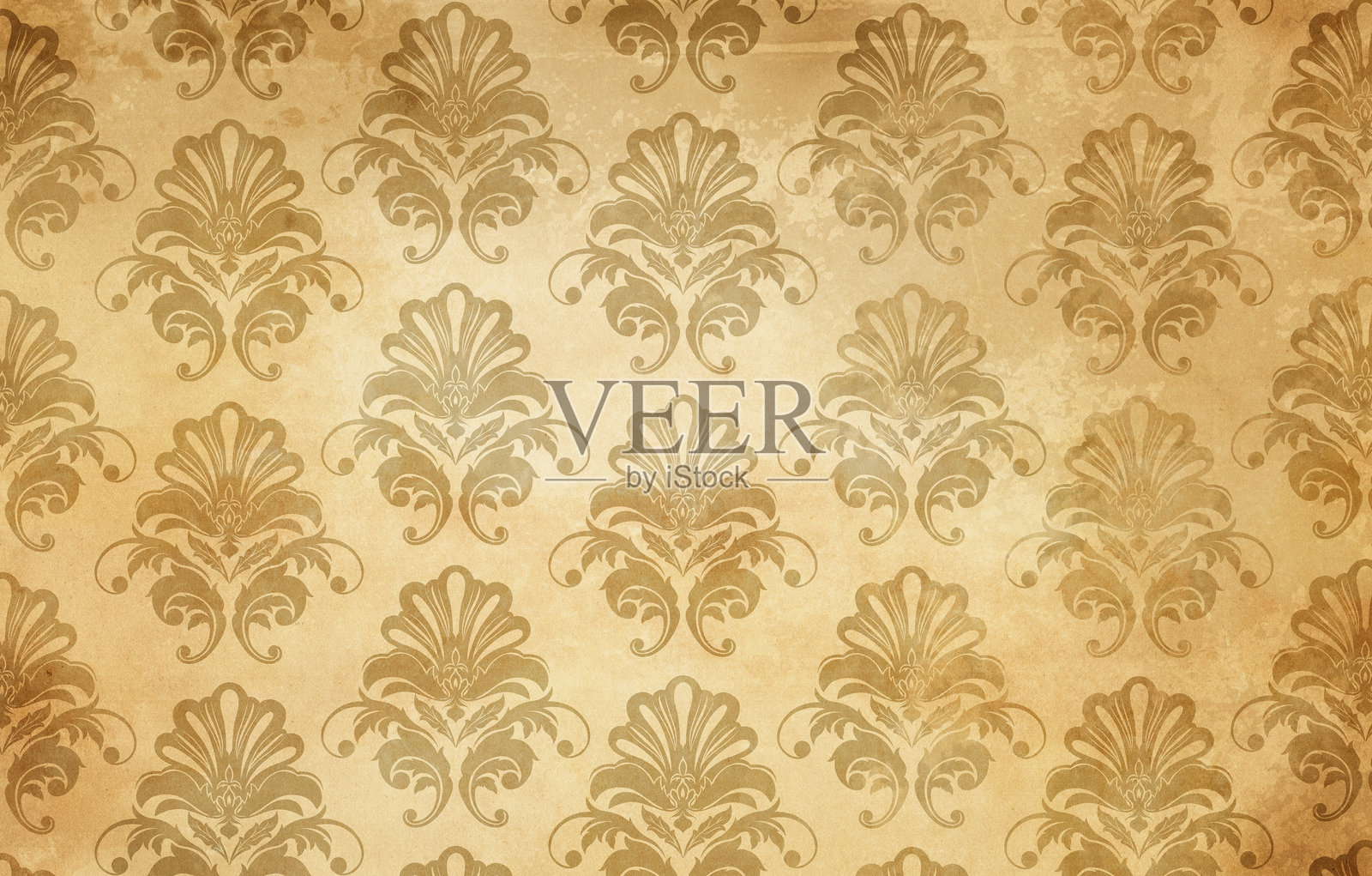 旧的磨损墙纸，上面有装饰性的花卉图案。照片摄影图片