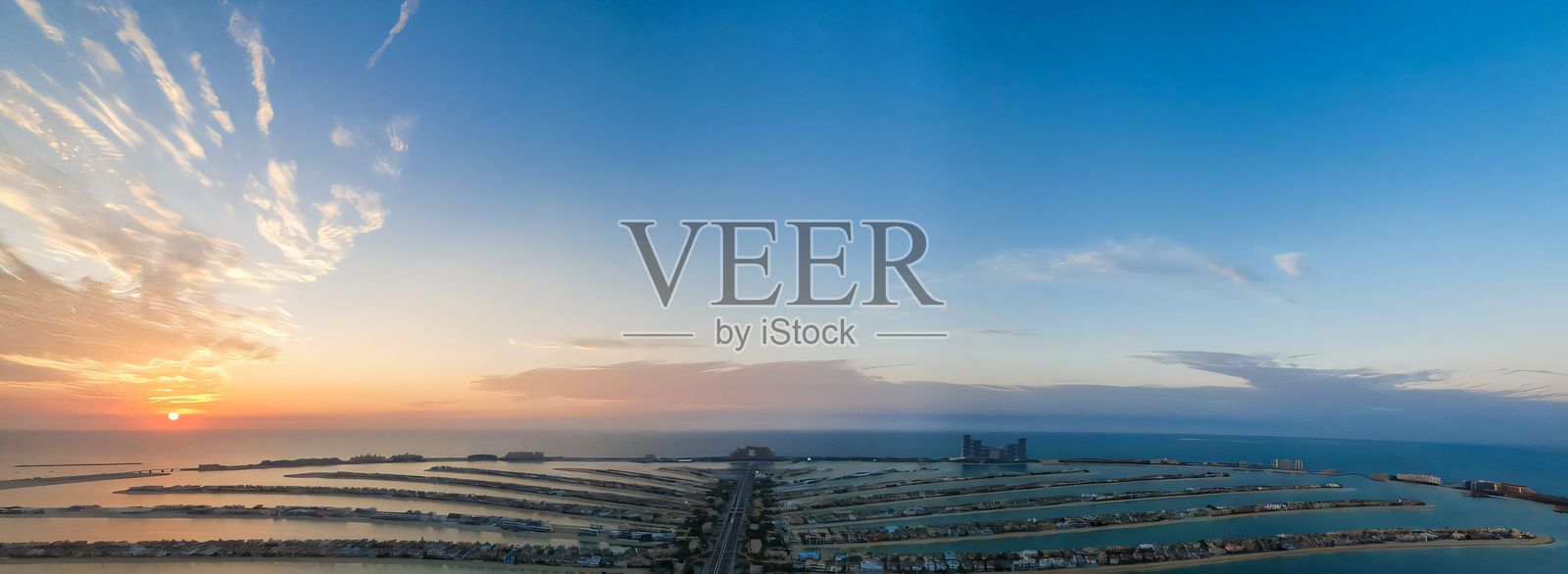 棕榈岛日落全景图。照片摄影图片