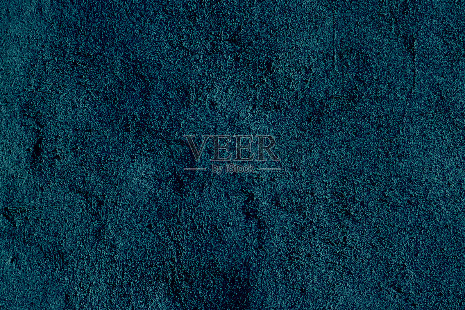 青色墙壁背景纹理，具有粗糙的表面和不规则的图案照片摄影图片