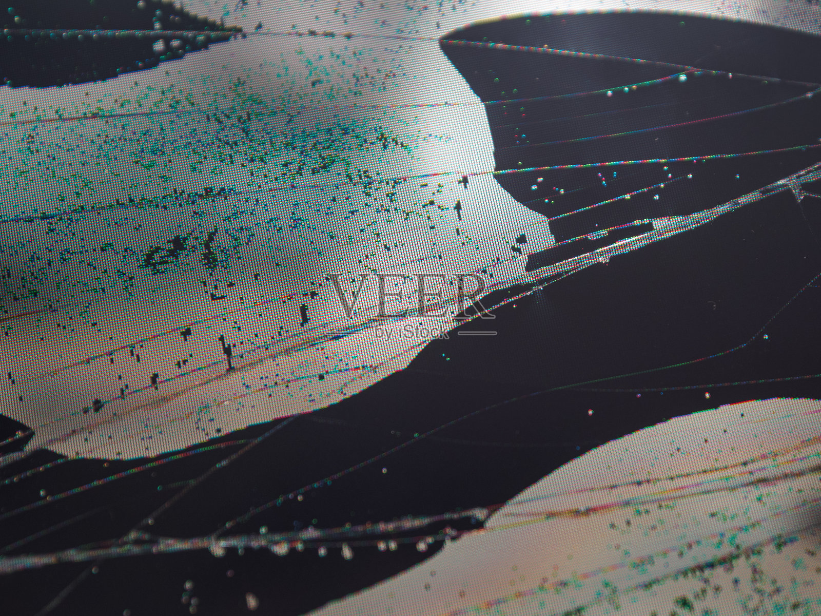 破损的LCD LED屏幕特写，显示像素失真和纹理，营造出数字戏剧效果。照片摄影图片