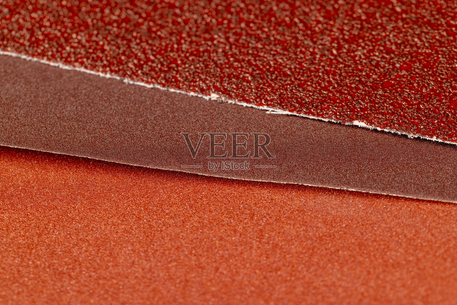 几种不同的砂纸用于金属或木材加工照片摄影图片