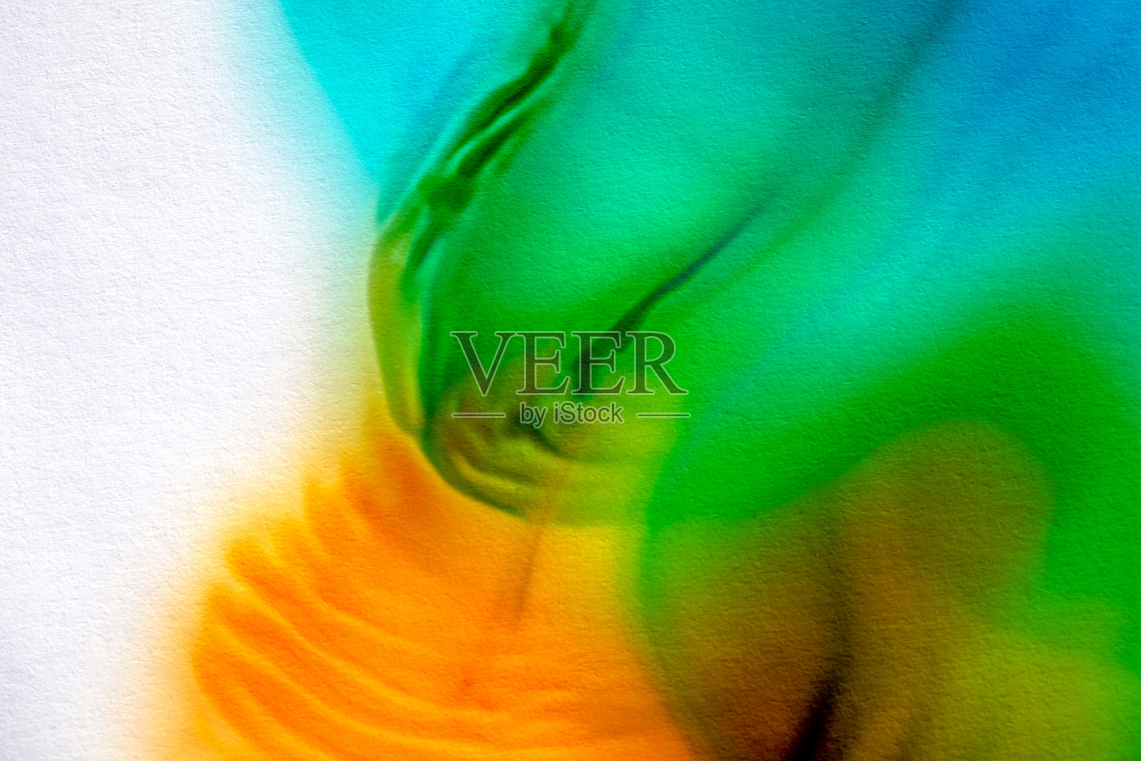 流动液体颜料在纸上的多彩纹理照片摄影图片