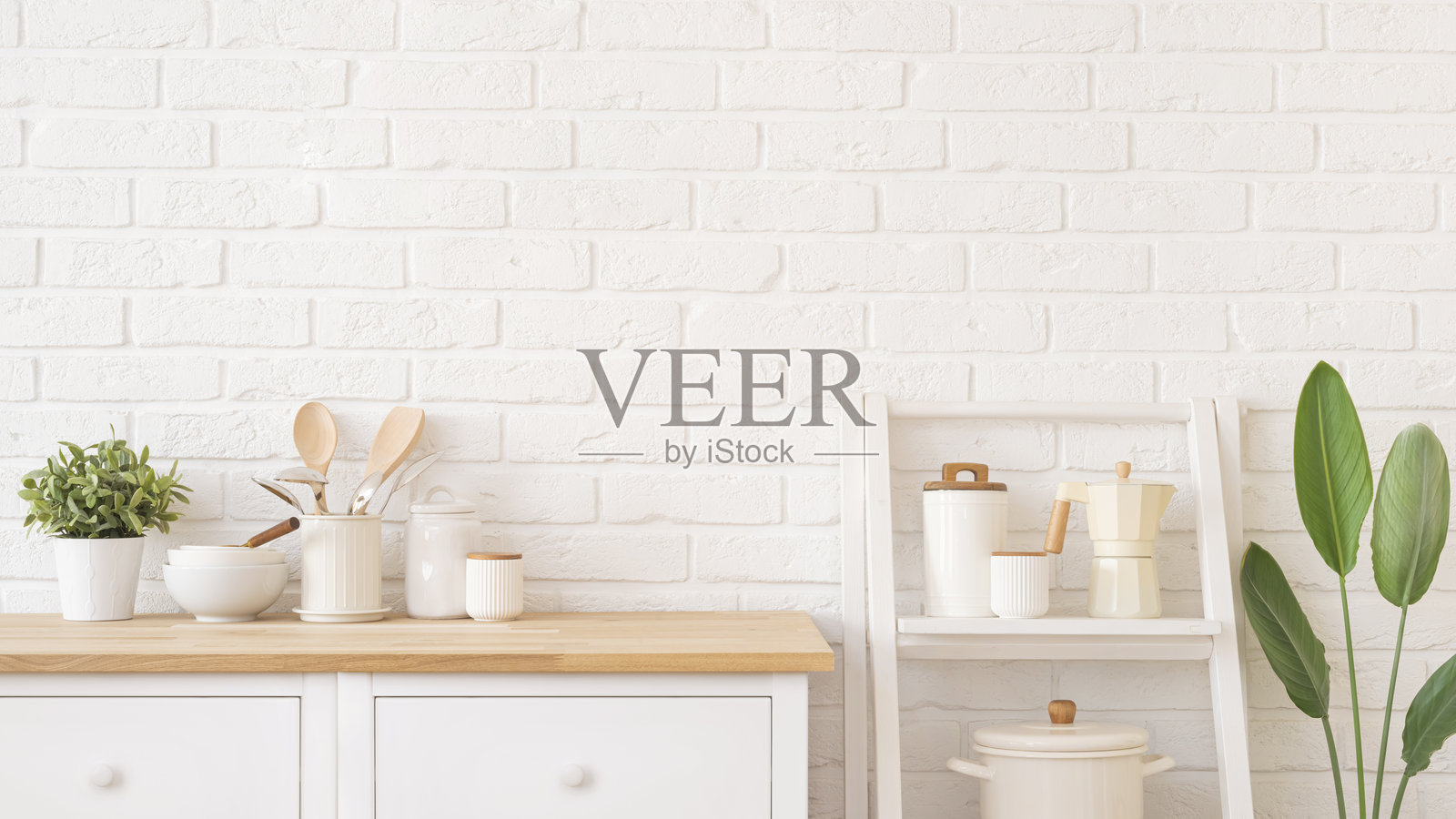 木质厨房橱柜表面和白色砖墙背景上的餐具、容器和碗照片摄影图片