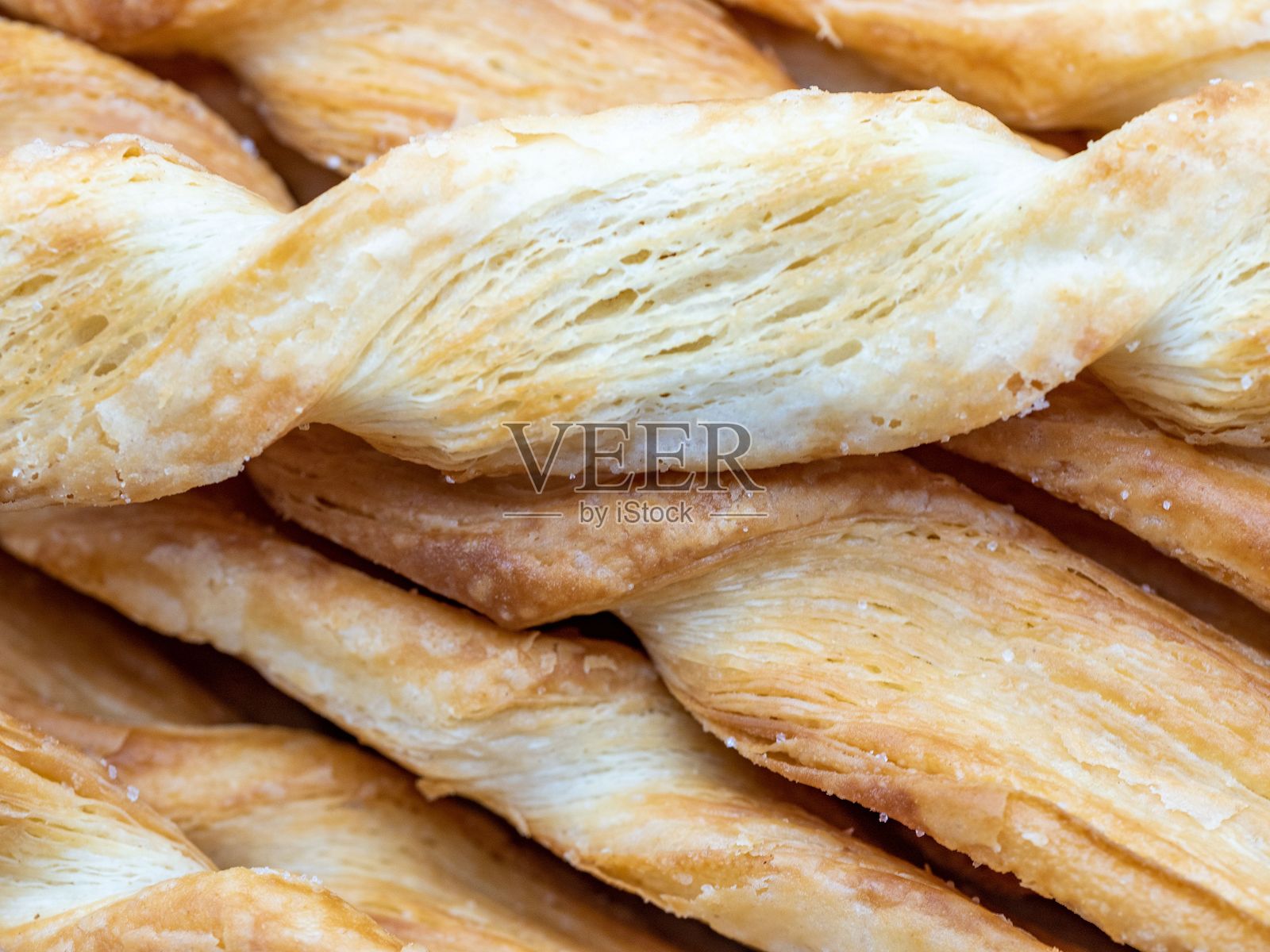 扭曲的泡芙面团棒特写照片摄影图片