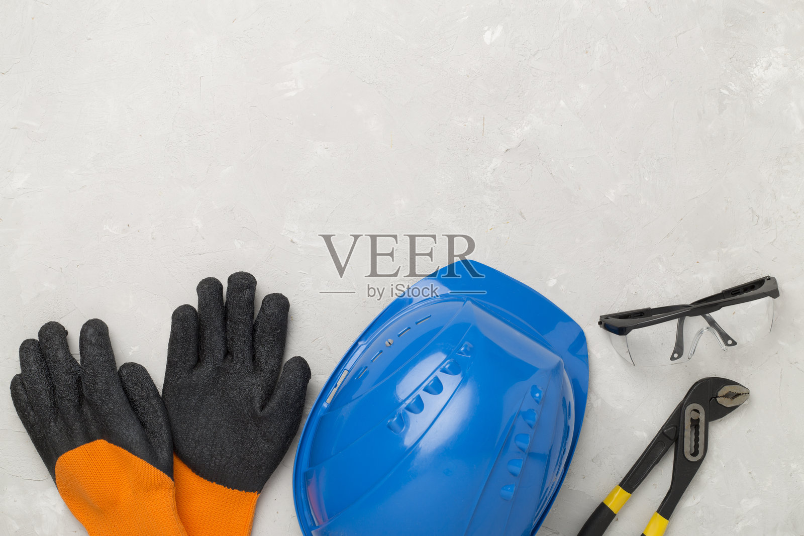 蓝色建筑设备在混凝土背景上，俯视图照片摄影图片