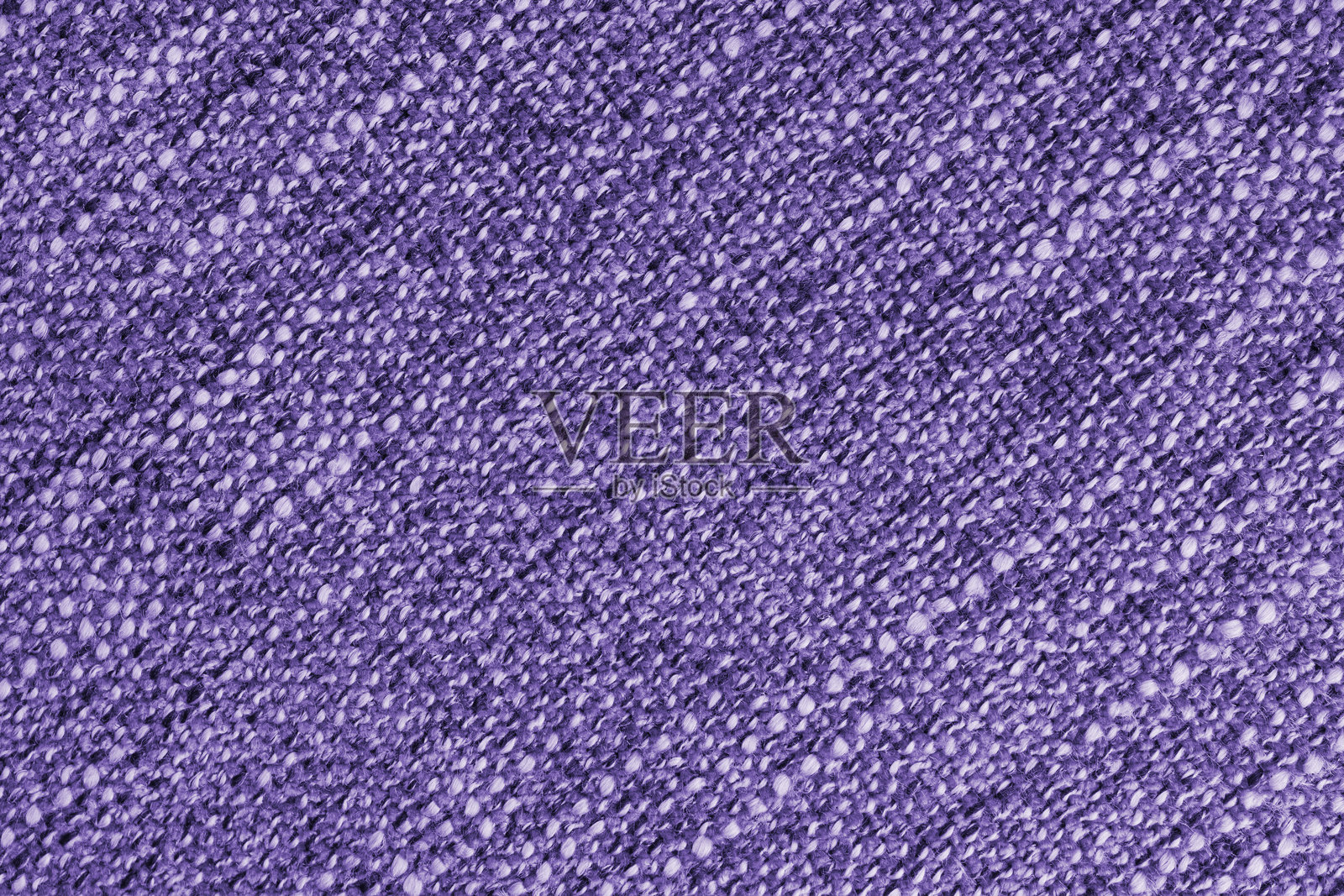 紫色提花面料，带有大松散的斜纹编织，粗糙的织物纹理背景照片摄影图片