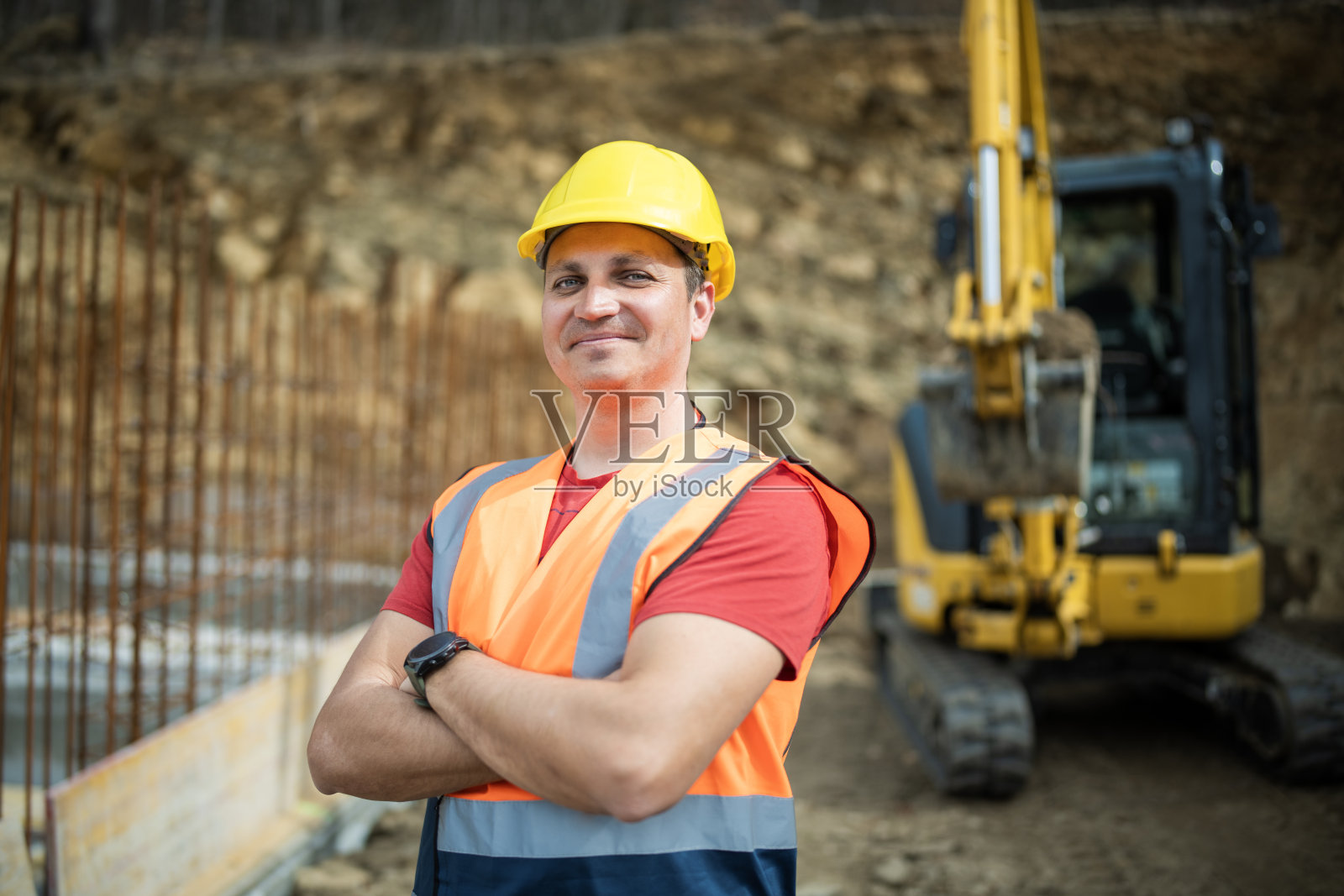 专业挖掘机司机/建筑工人的肖像照片摄影图片