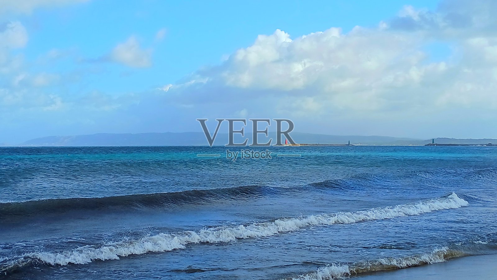 比泽尔特海滩上的海浪照片摄影图片