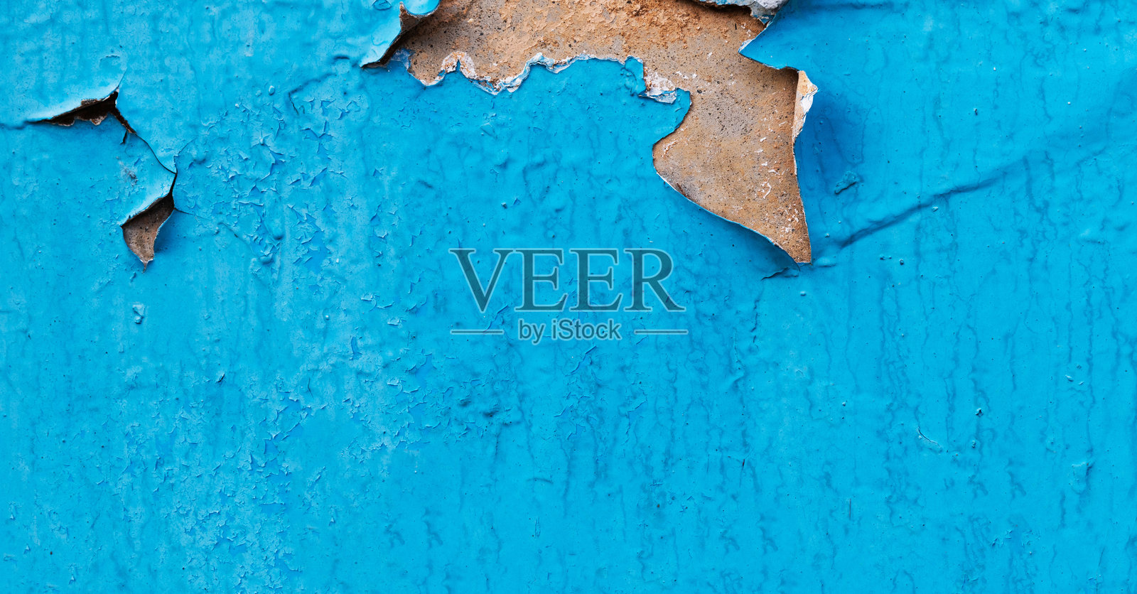 蓝色剥落油漆纹理的混凝土墙照片摄影图片