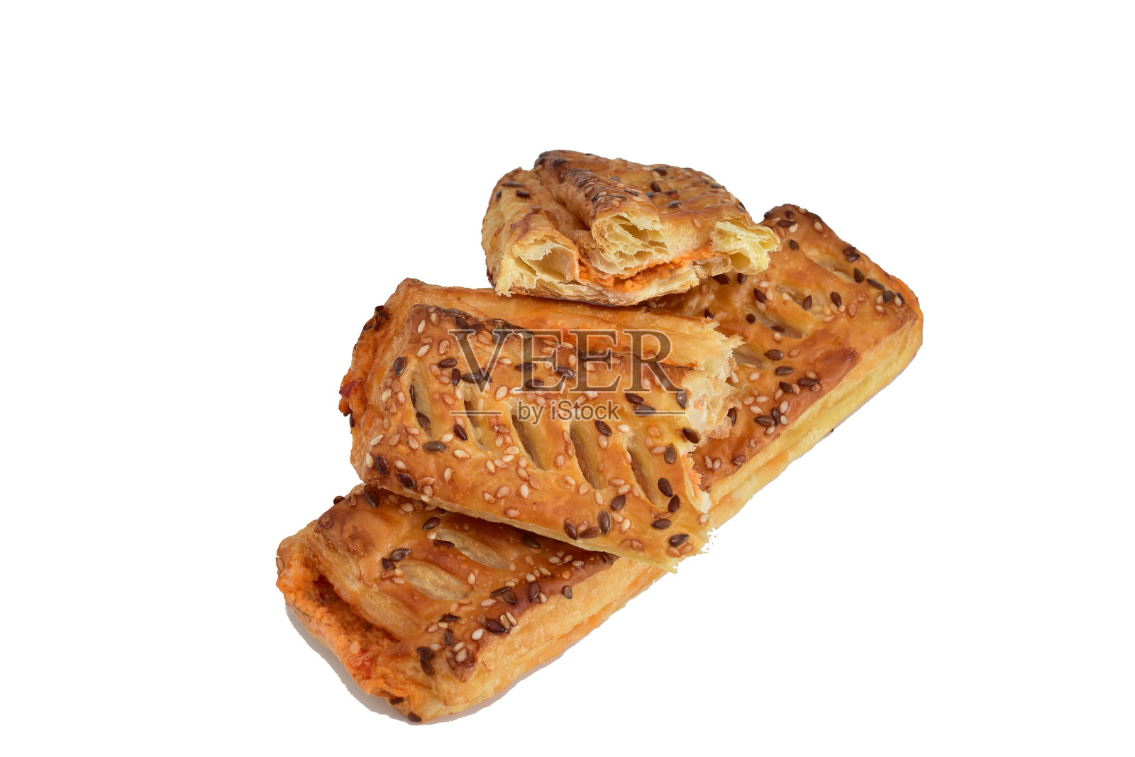 酥皮包子，内含馅料。照片摄影图片