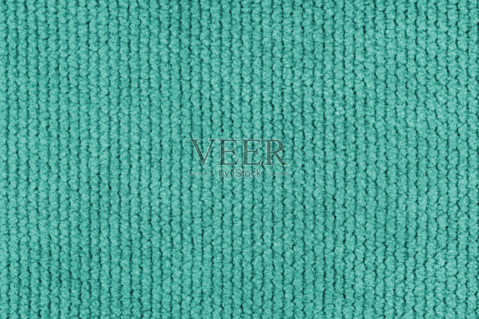 土耳其蓝天鹅绒提花面料的纹理特写，微距。布料结构，纺织背景。照片摄影图片