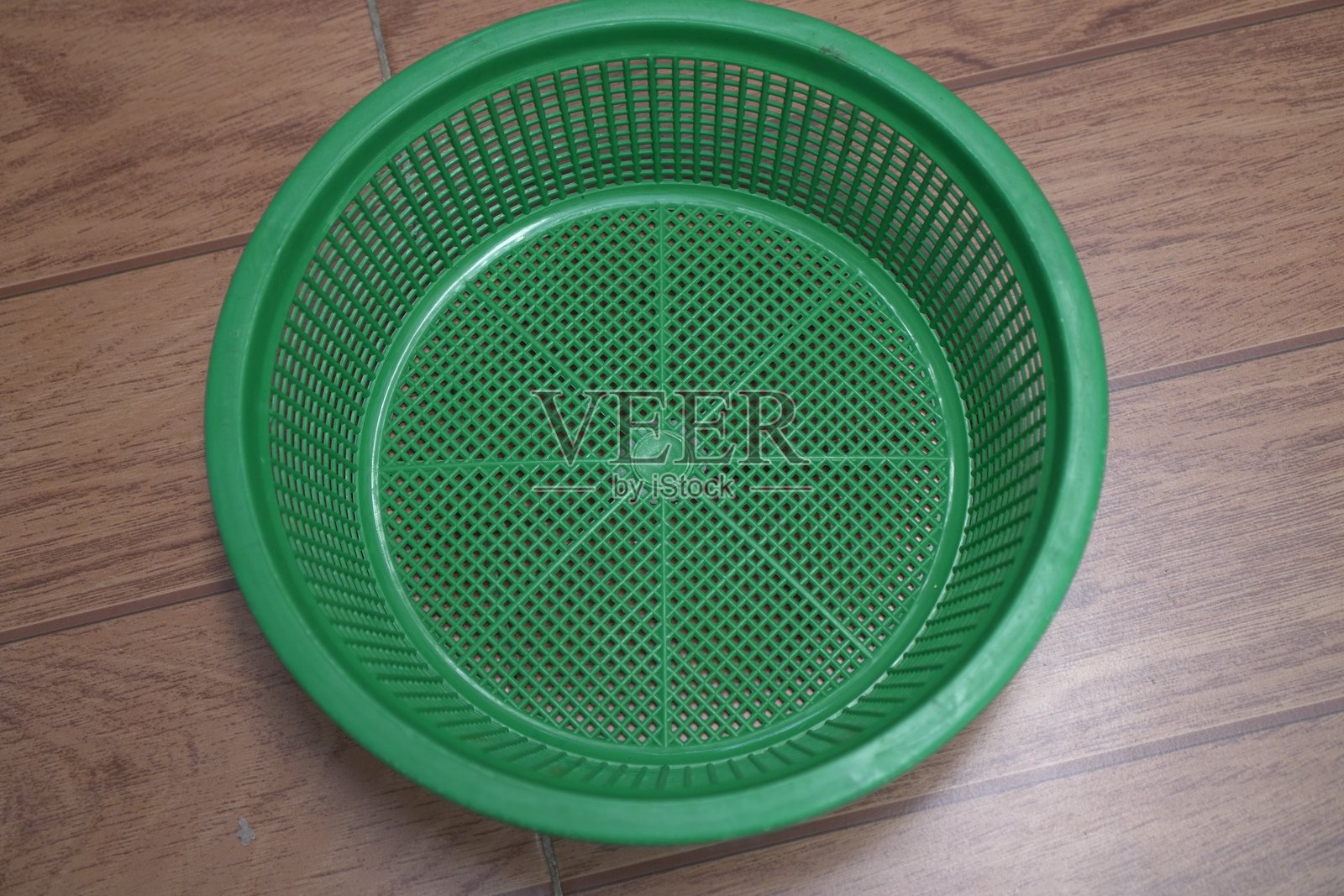 明亮绿色的厨房滤网照片摄影图片