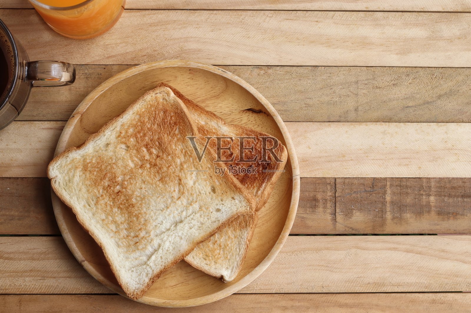 吐司面包、黑咖啡和橙汁的早餐照片摄影图片