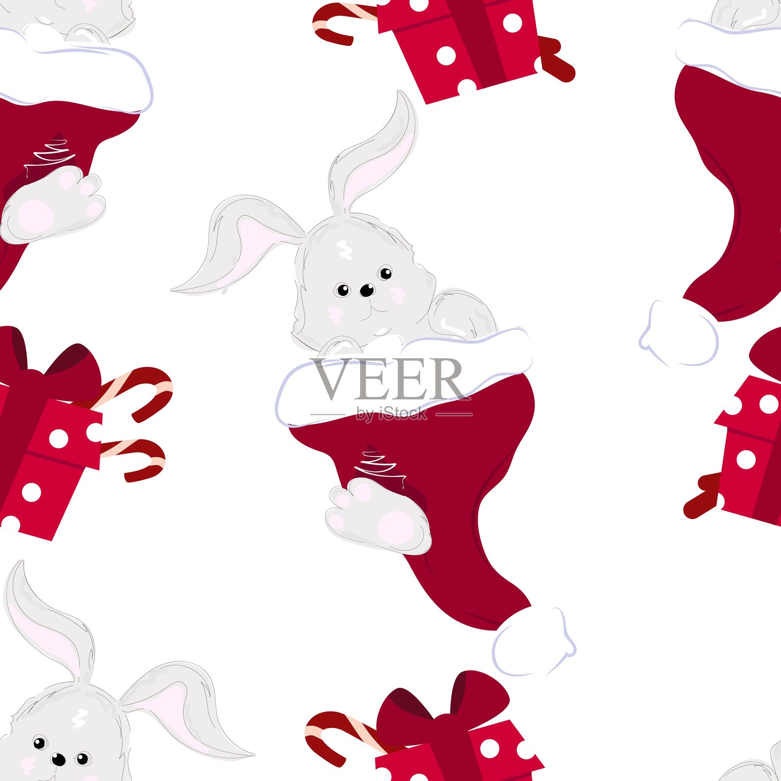 一只可爱的灰色兔子坐在圣诞老人帽子和装满糖果的红色礼品盒里，形成无缝图案。插画图片素材