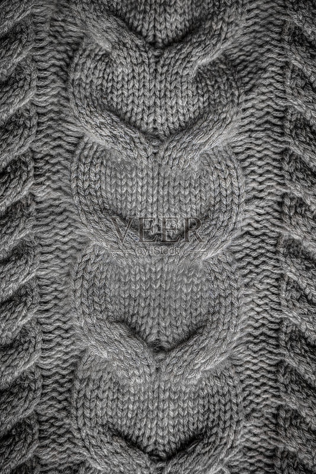 灰色针织羊毛图案，针织纹理特写照片摄影图片