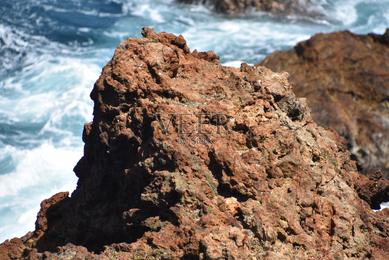 阿鲁巴的海岸熔岩岩石突出部照片摄影图片