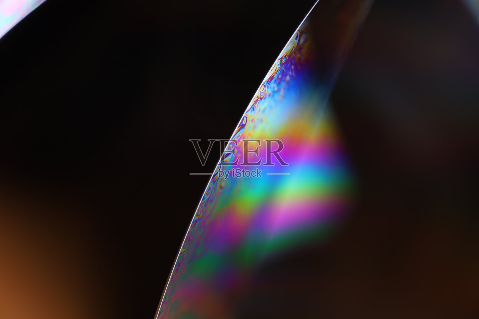 黑色背景上的彩虹效果，波浪运动，气泡背景照片摄影图片