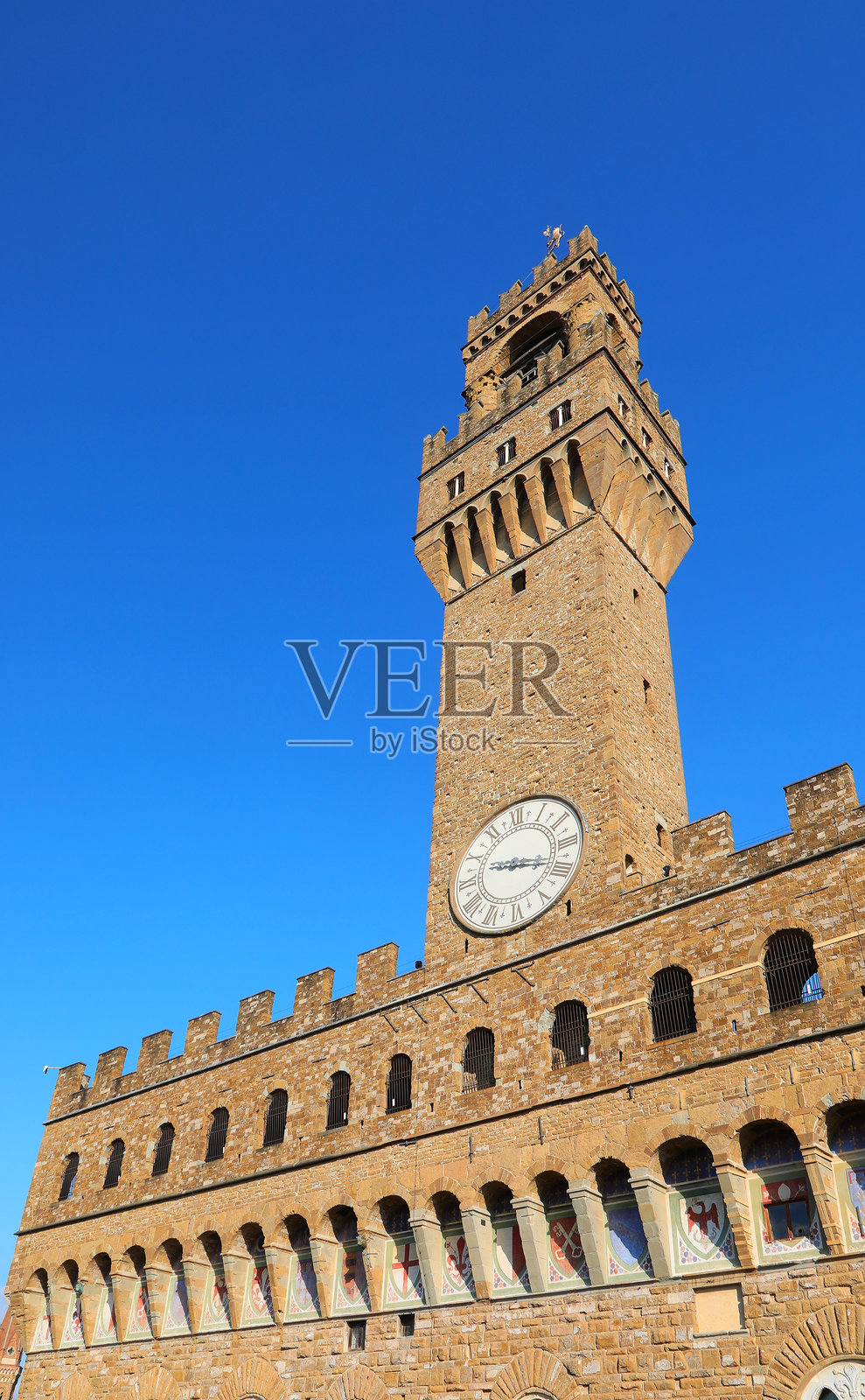 老宫殿的钟楼和城垛，亦称为西尼奥里亚宫照片摄影图片