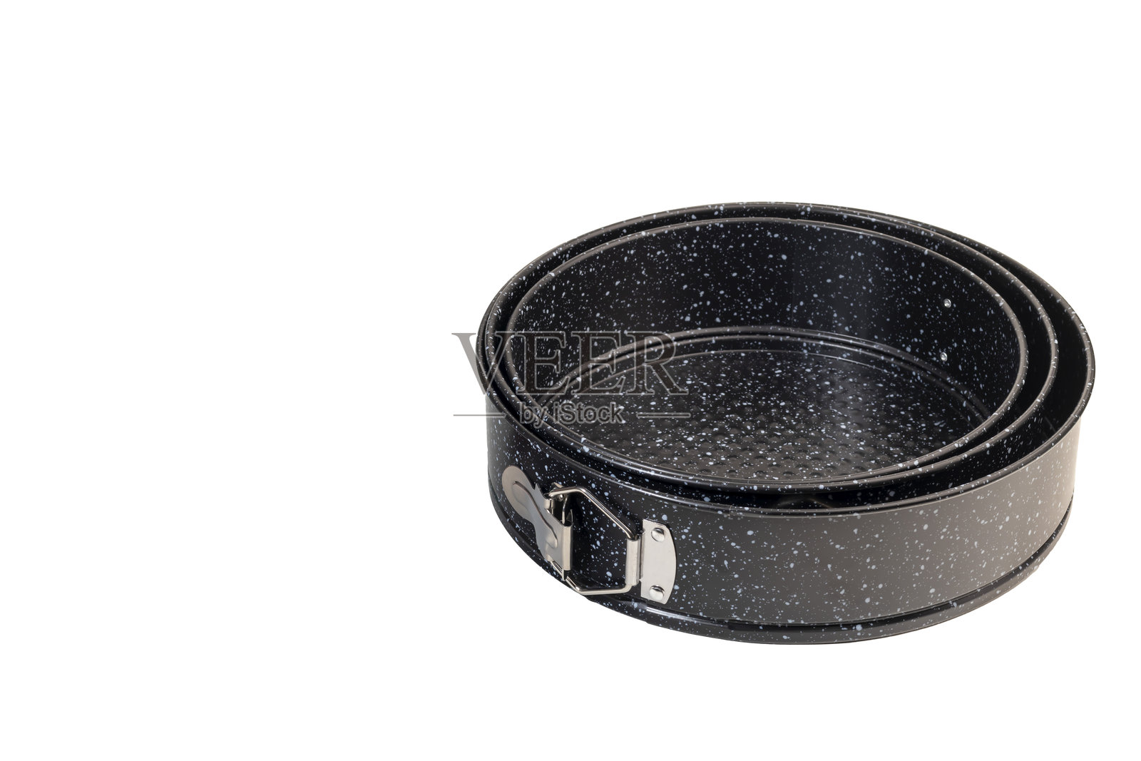 金属烘焙盘用于蛋糕和面包。烤箱烘焙。照片摄影图片