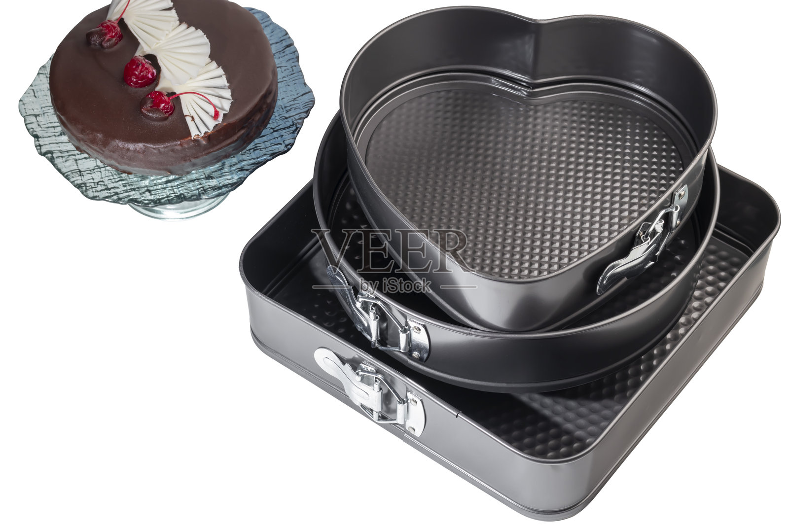 金属烘焙盘用于蛋糕和面包。烤箱烘焙。照片摄影图片