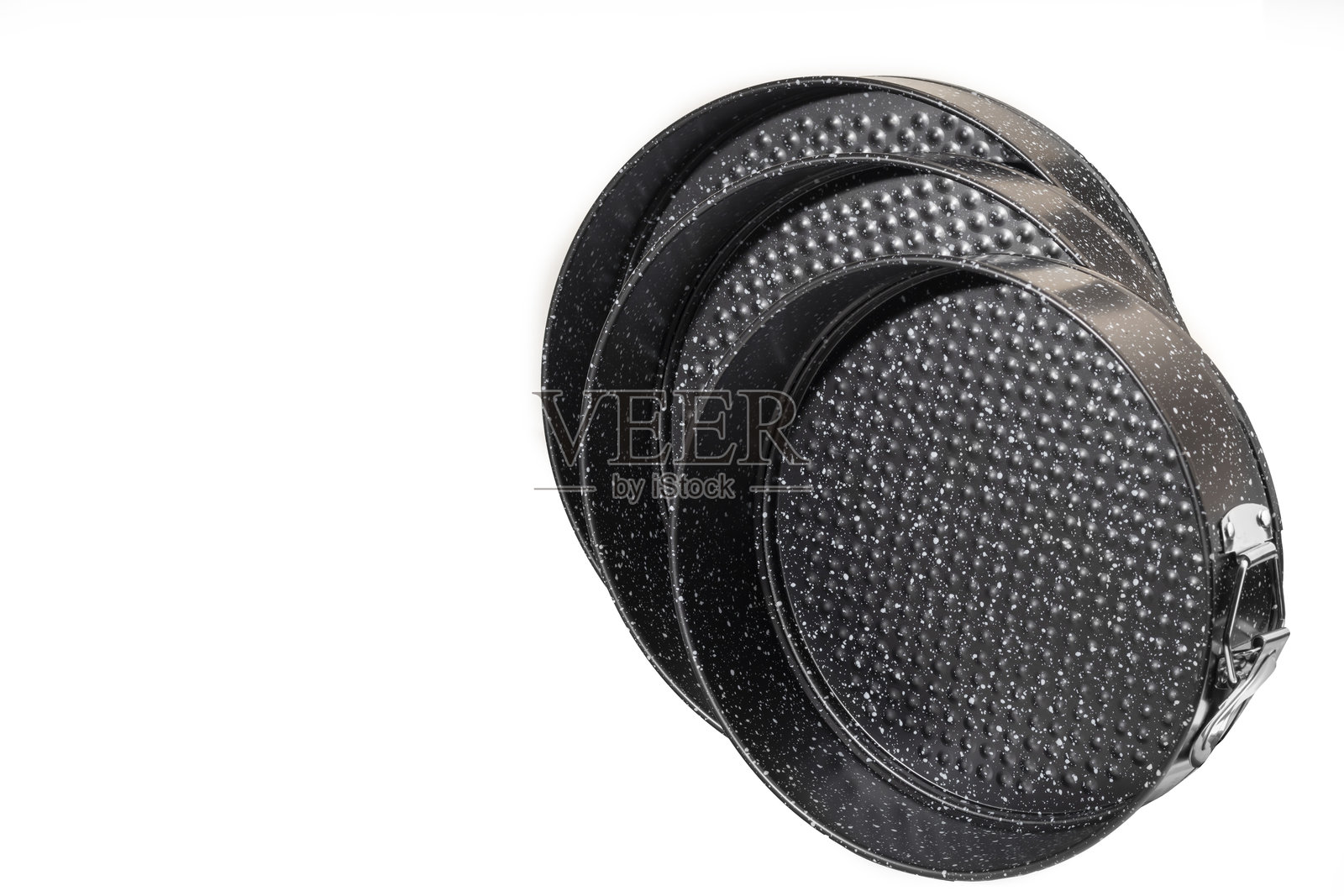 金属烘焙盘用于蛋糕和面包。烤箱烘焙。照片摄影图片