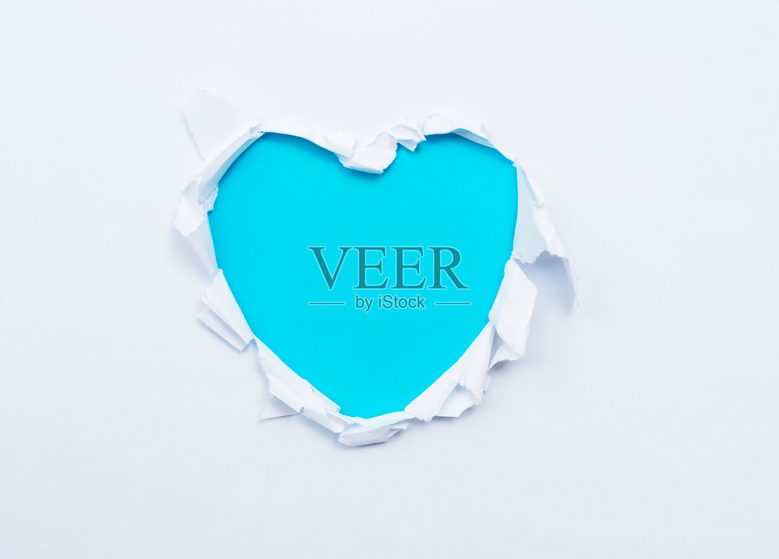 撕开纸张成心形照片摄影图片