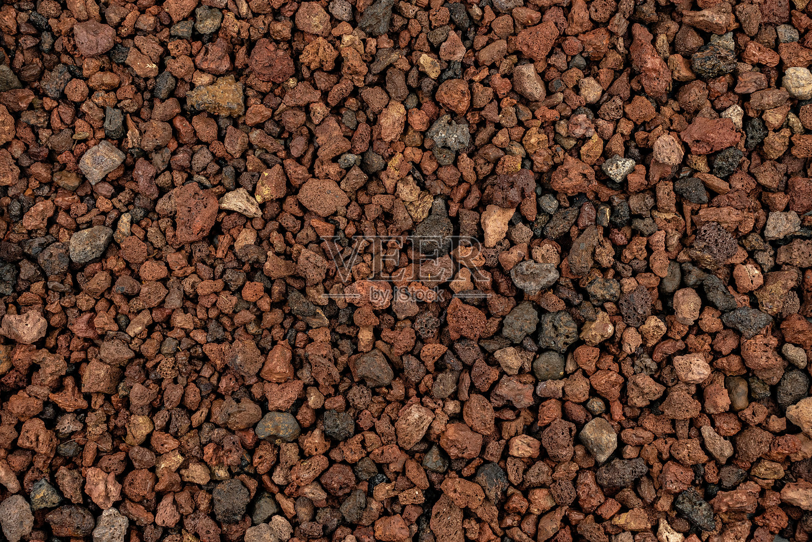 火山灰、火山碎石和红色火山石的特写背景纹理照片摄影图片