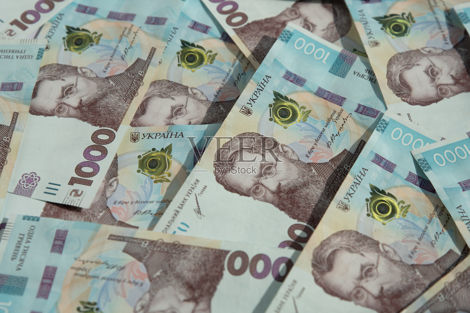 乌克兰货币。乌克兰纸币的纹理。乌克兰格里夫纳钞票。UAH纸币。1000格里夫纳。商业、金融、新闻背景。3D插图。照片摄影图片