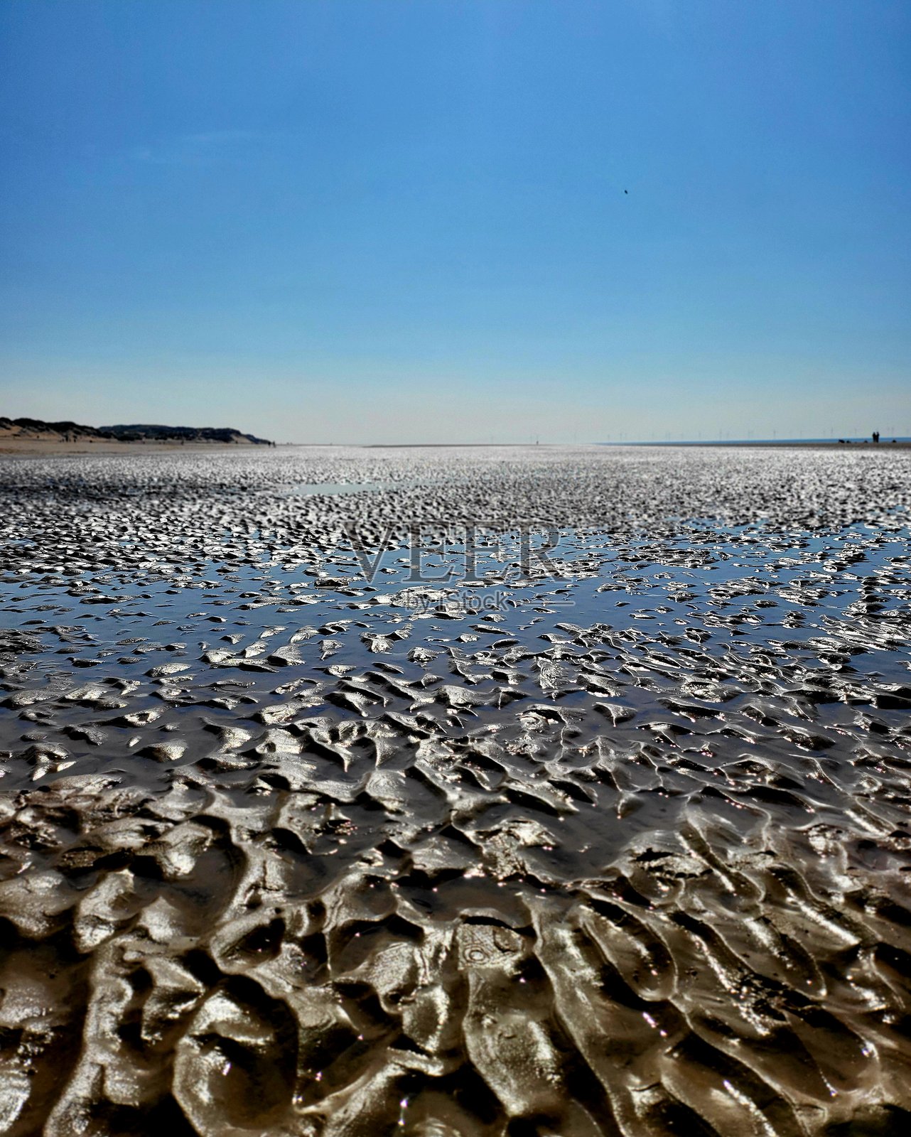 一片空旷的海滩照片摄影图片