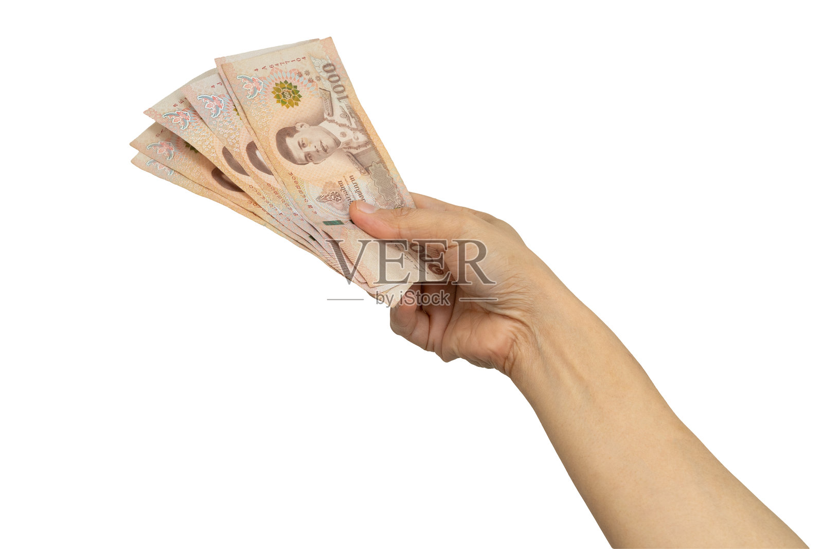 亚洲女性手持泰铢纸币，背景为白色。照片摄影图片