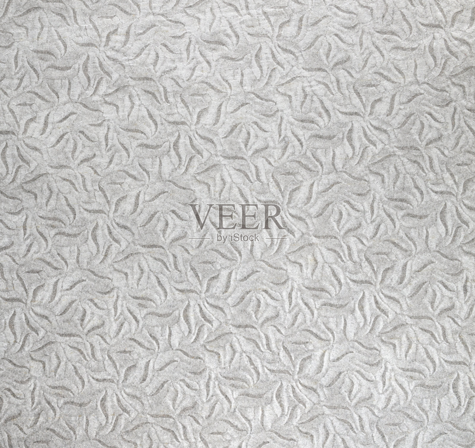 开孔玻璃纸（也称为水晶纸）在中性背景上，适用于背景或模型。照片摄影图片