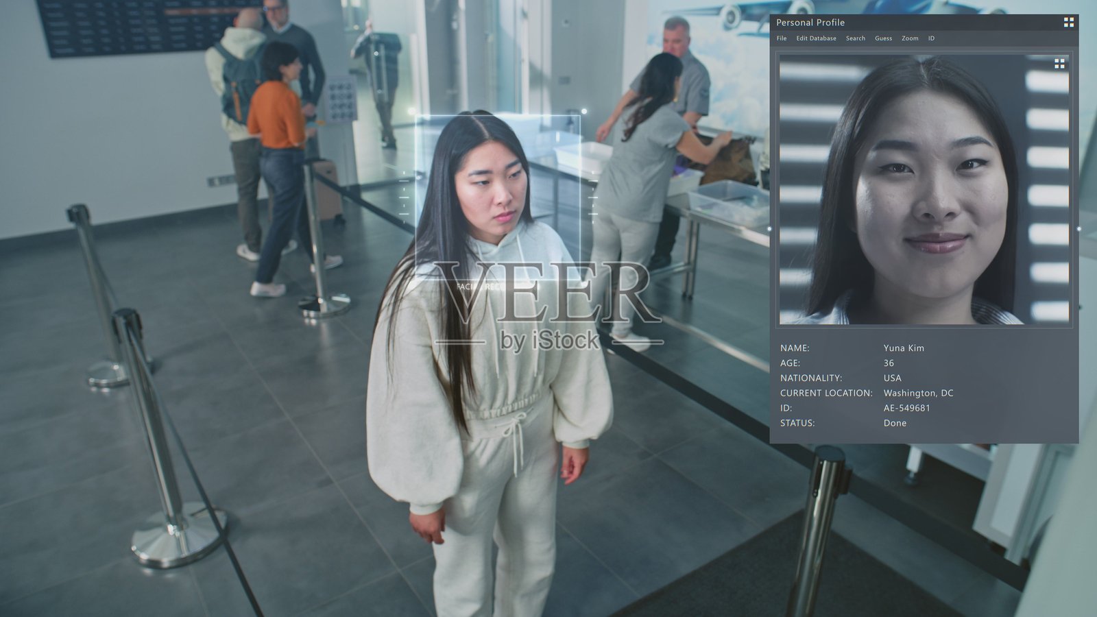 机场安检：配备人工智能生物识别面部识别的监控摄像头照片摄影图片