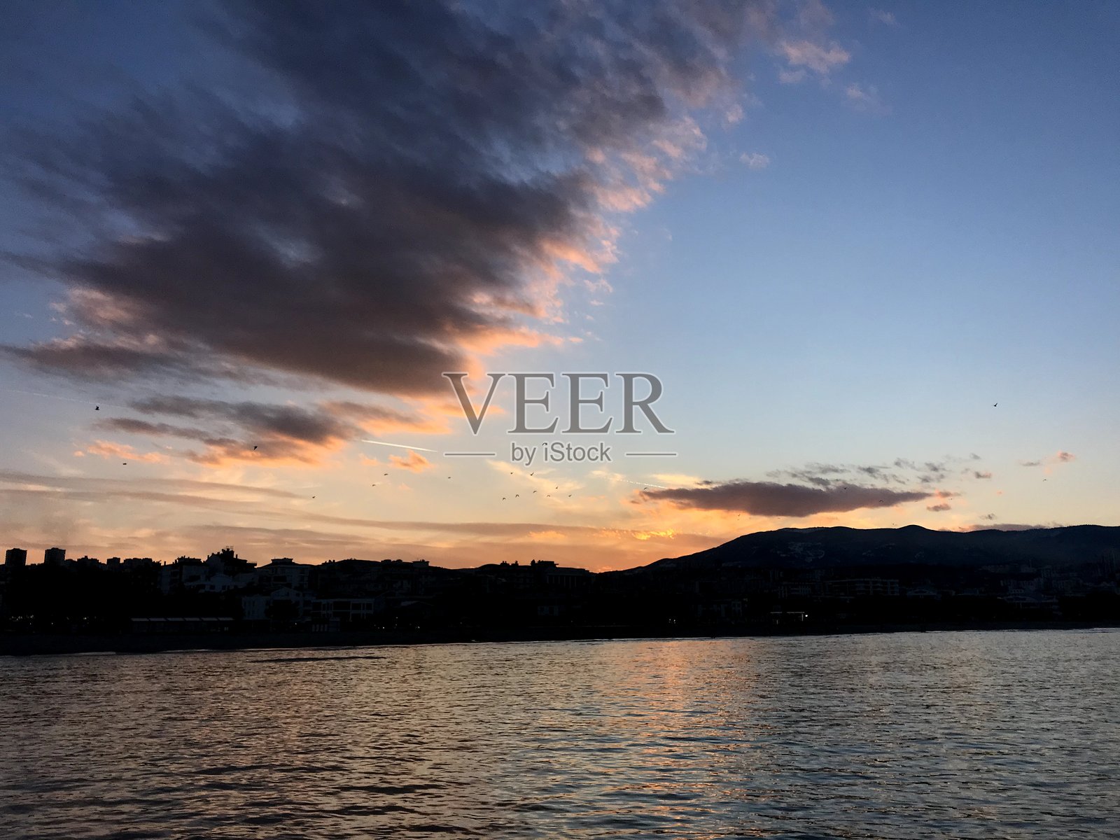 日落海岸线照片摄影图片