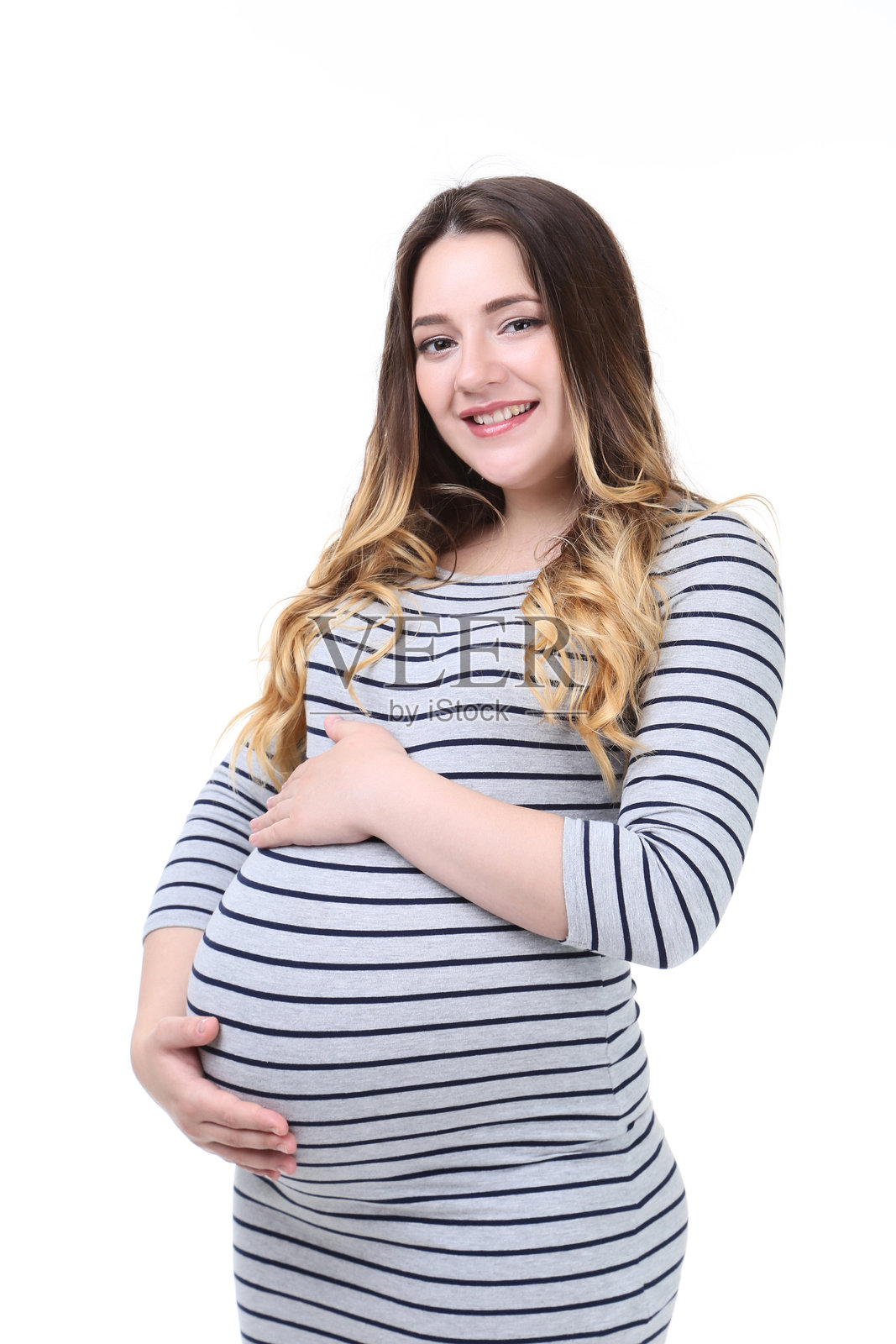 美丽的孕妇在白色背景上照片摄影图片