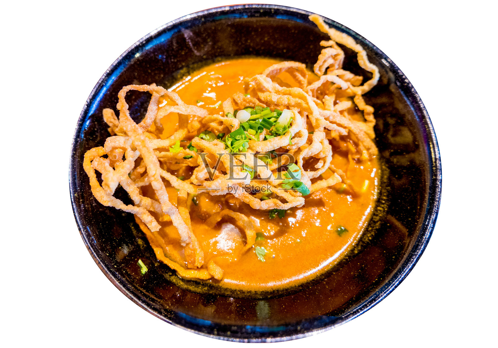 从上方俯视的北泰咖喱鸡面条，聚焦选择性。照片摄影图片