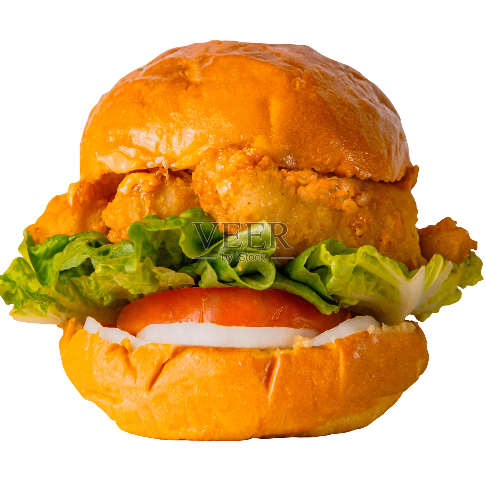 金黄酥脆的鱼片汉堡，搭配新鲜生菜和番茄，光滑的布里欧修面包，海鲜风味的快餐经典照片摄影图片