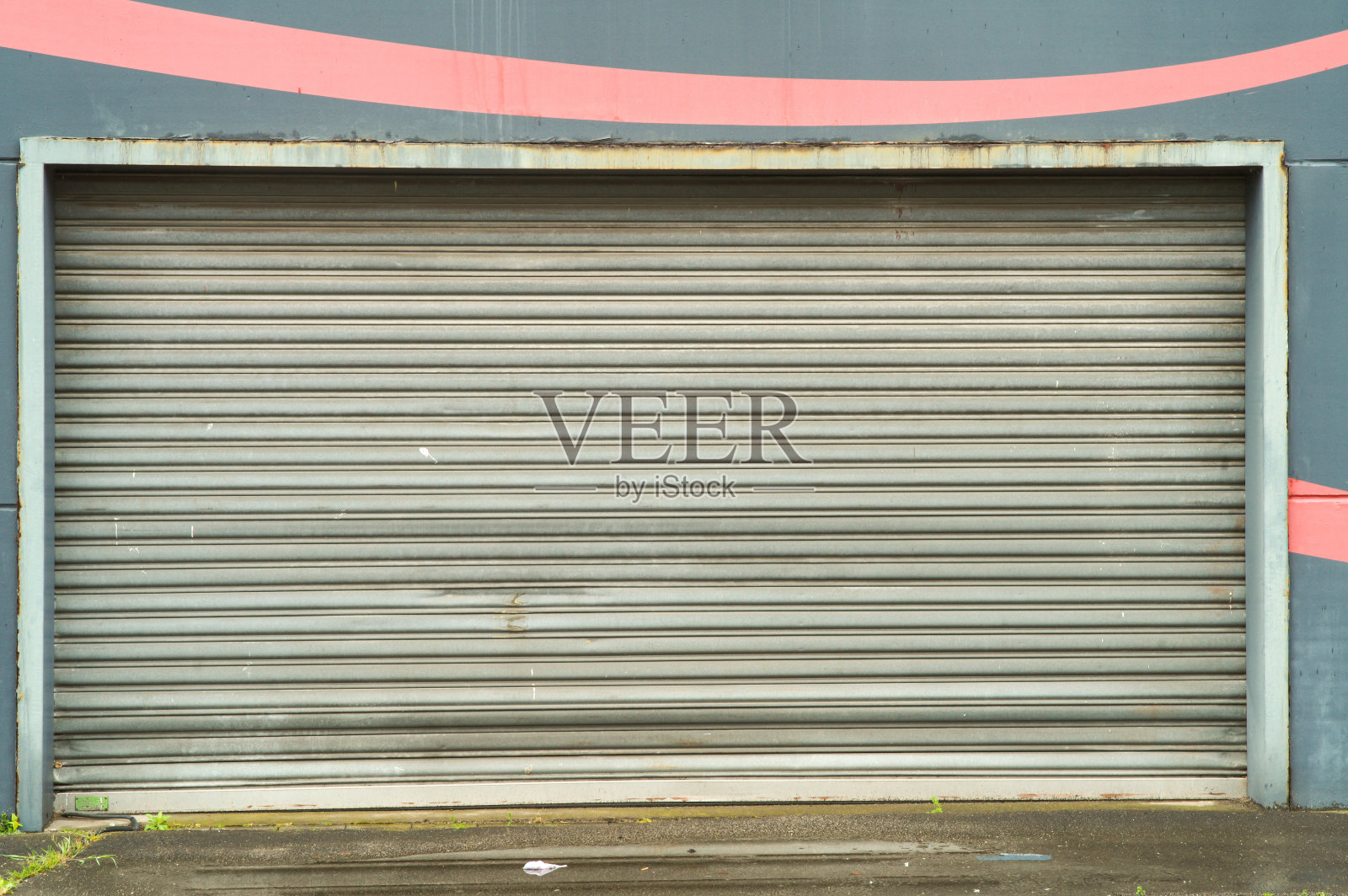 关闭的金属卷帘门保护车库入口照片摄影图片