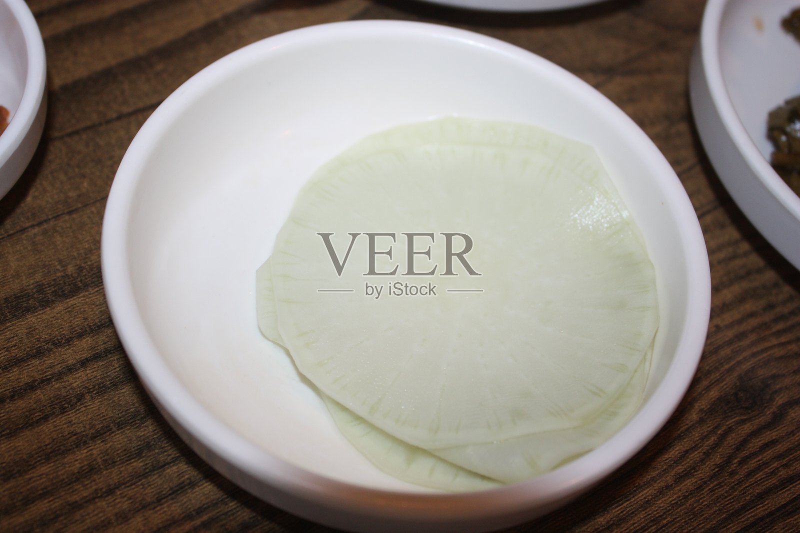 腌萝卜卷照片摄影图片