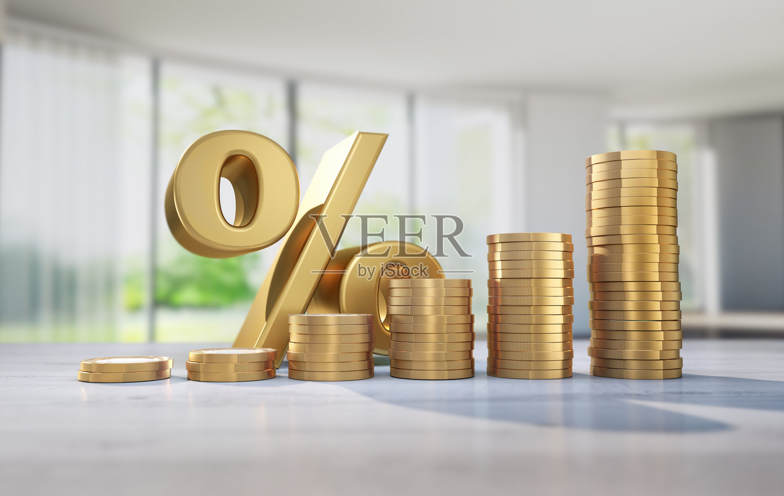 金色硬币堆叠在公寓背景前照片摄影图片