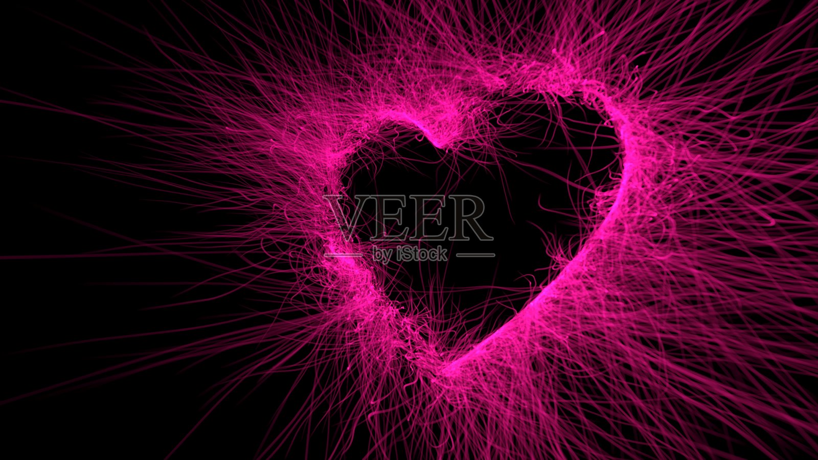 背景描绘了一个由光轨组成的黑色背景上的粉色心形图案照片摄影图片