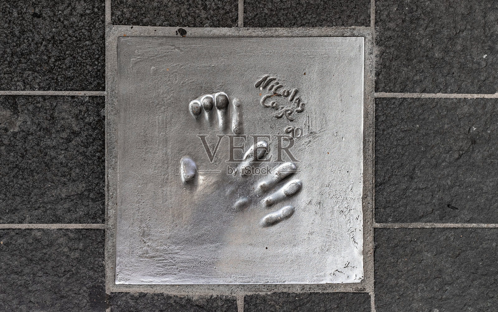 尼古拉斯·凯奇的手印。照片摄影图片